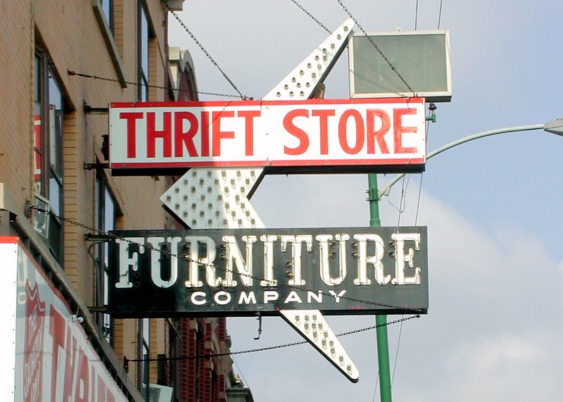 "Thrift Store Furniture Company" sign.